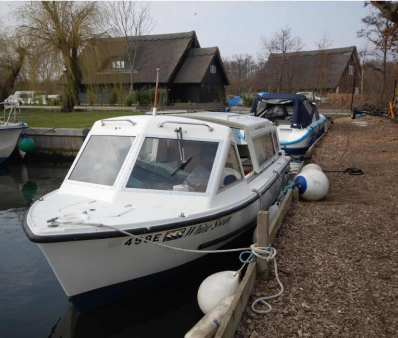 A boat moored up in one of many places in horning to keep you day boat