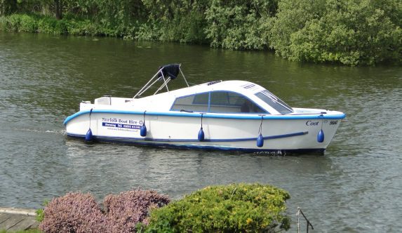 Day Boat on the river