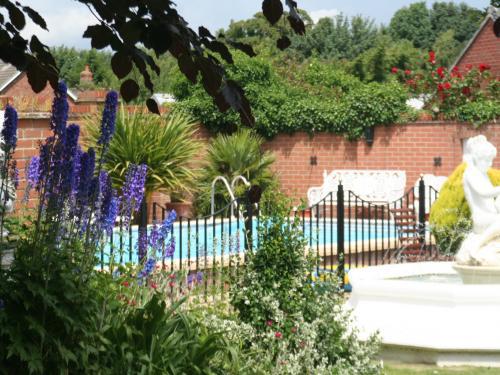 Outdoor swimming pool at The Old Rectory Hotel Crostwick