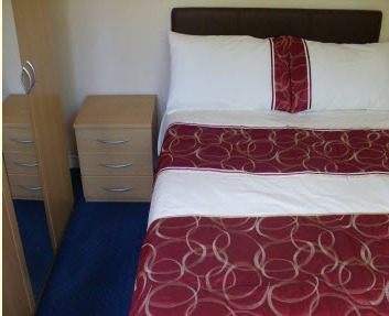 Bedroom of Wentworth Holiday Chalets