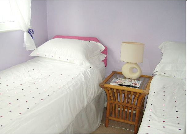 Sample twin bedroom of Winterton Chalets