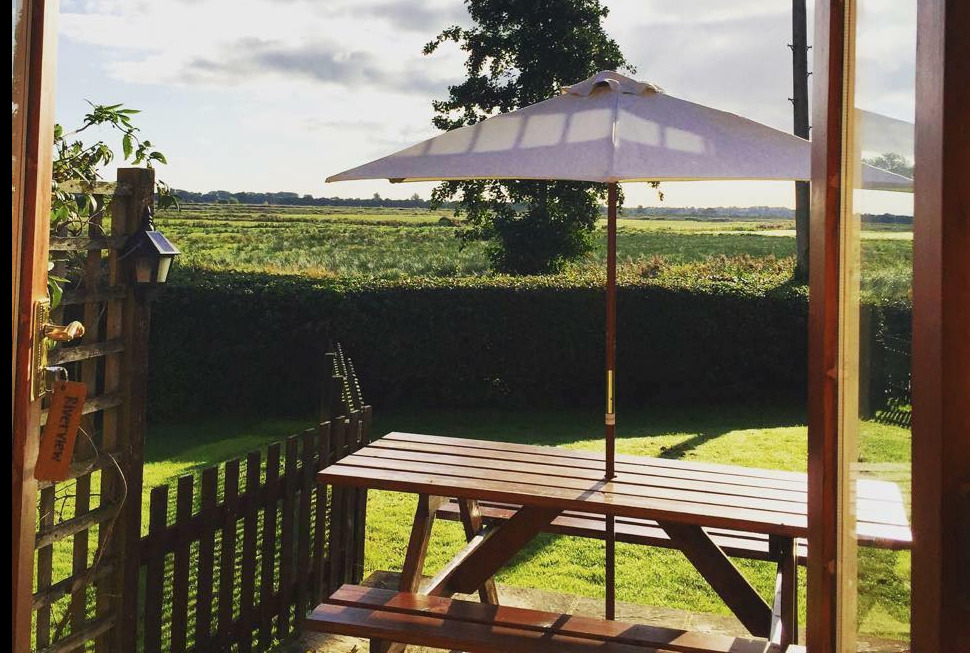 Patio and views for Hall Farm Cottages