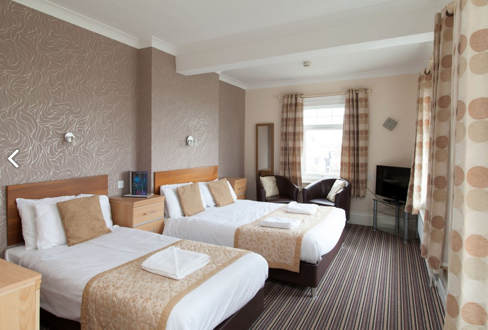 Bedroom In The Marine Lodge Hotel